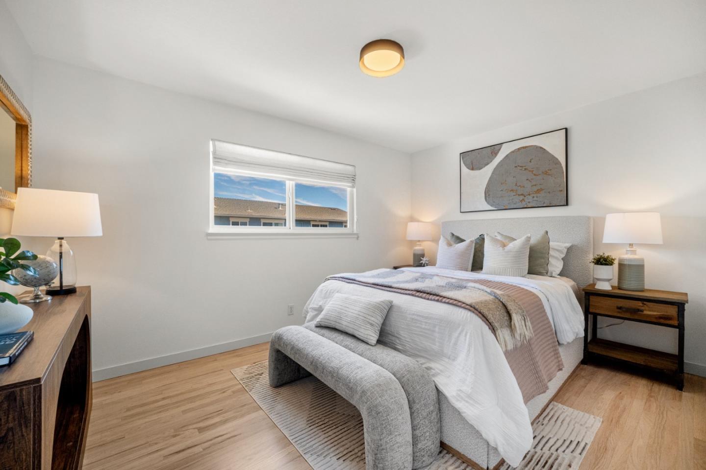 861 Haddock Street Foster City, CA 94404 - Photo 23 of 40 a bedroom with a bed and a lamp on dresser