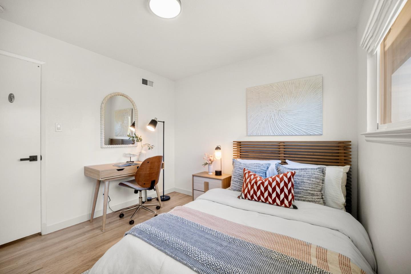 861 Haddock Street Foster City, CA 94404 - Photo 25 of 40 a bedroom with a bed and wooden floor