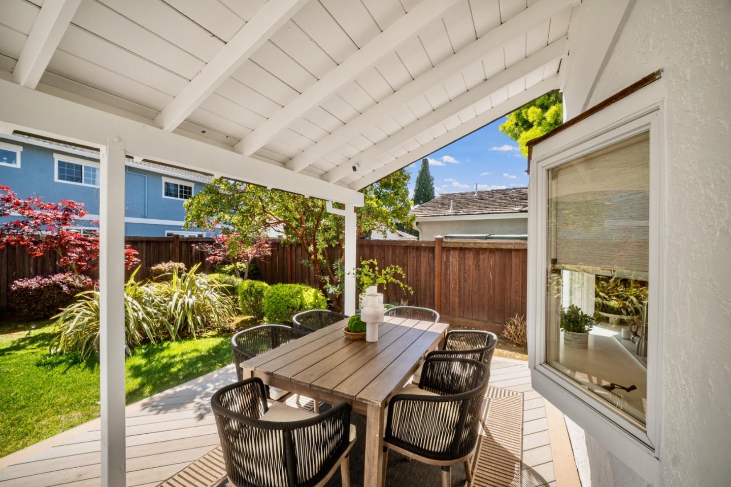 861 Haddock Street Foster City, CA 94404 - Photo 34 of 40 a view of a patio with table and chairs potted plants with wooden floor