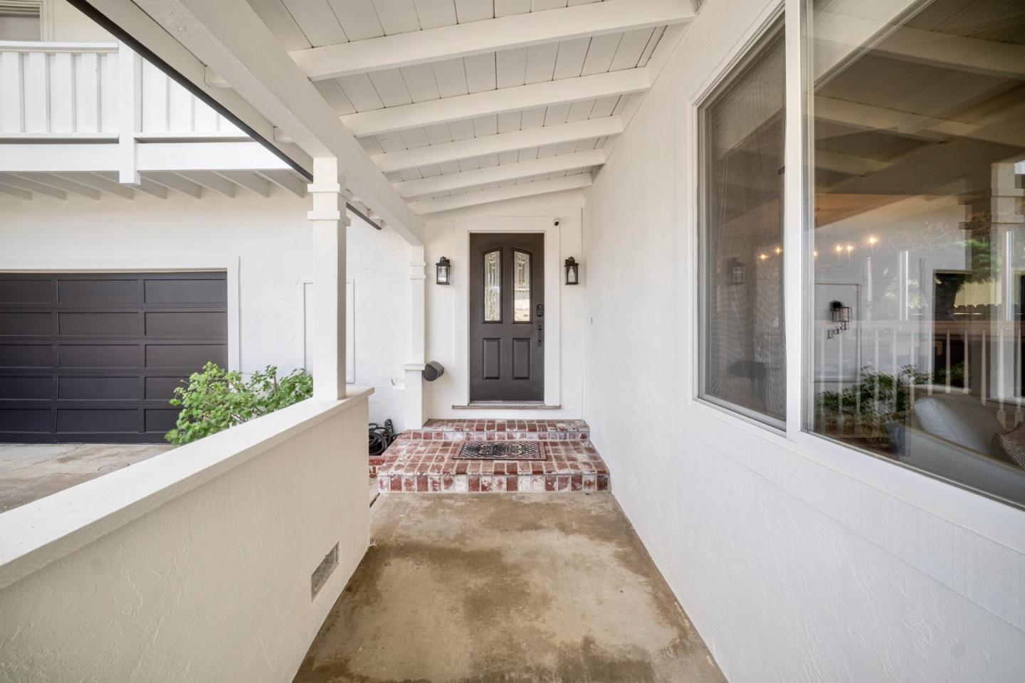 861 Haddock Street Foster City, CA 94404 - Photo 4 of 40 a front view of a house with a yard