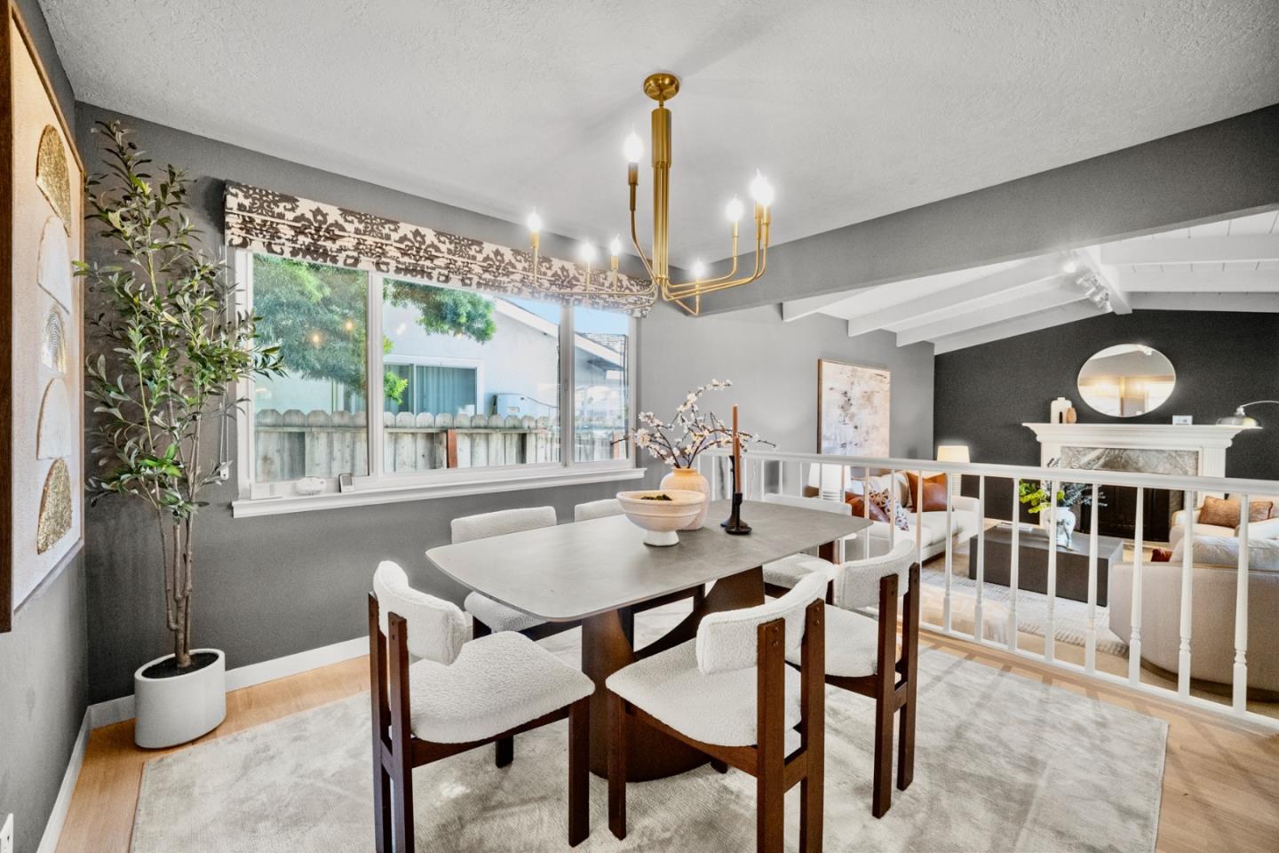 861 Haddock Street Foster City, CA 94404 - Photo 8 of 40 a dining room with wooden floor a chandelier a wooden table and chairs