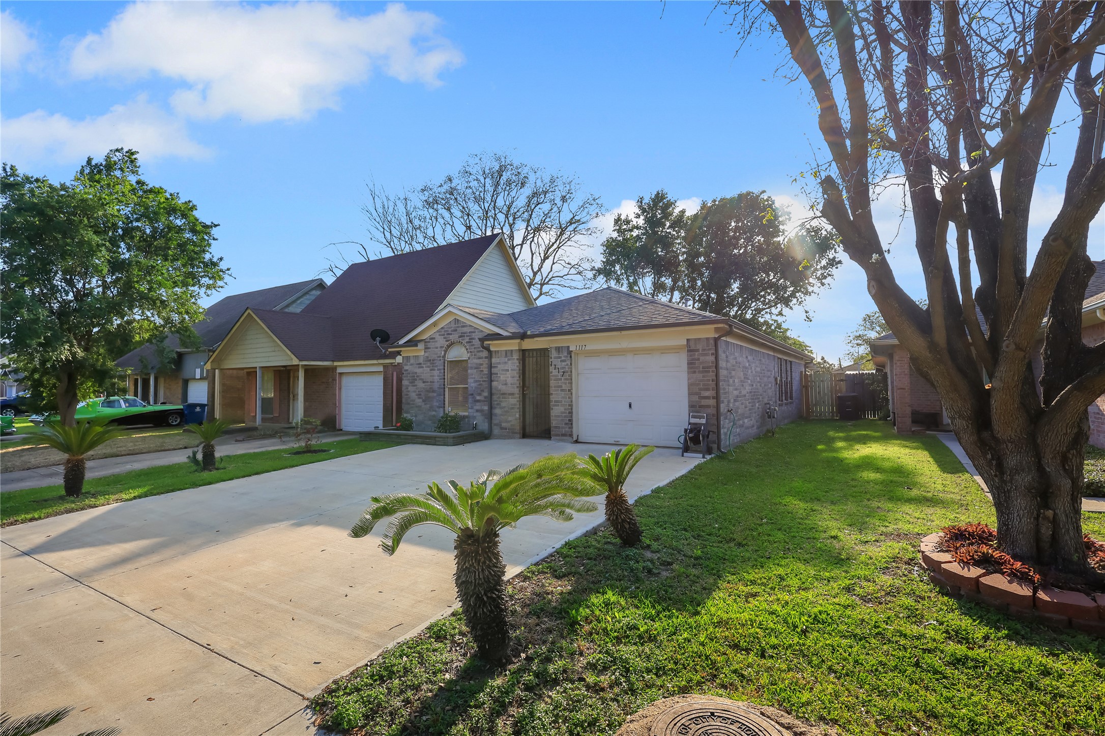 1117 Willersley Lane Channelview, TX 77530 - Photo 2 of 27 a front view of a house with garden