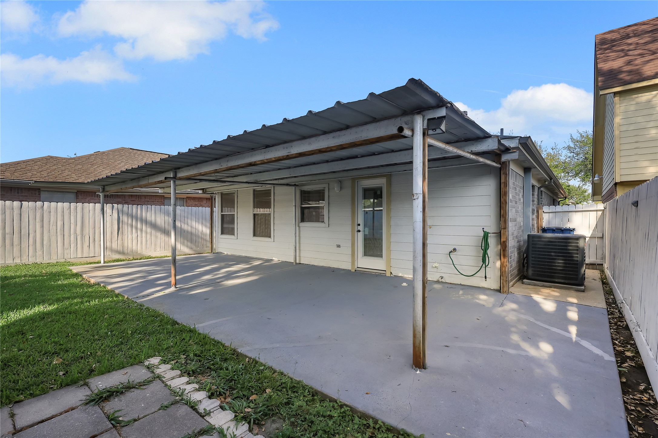 1117 Willersley Lane Channelview, TX 77530 - Photo 25 of 27 a view of a house with a patio