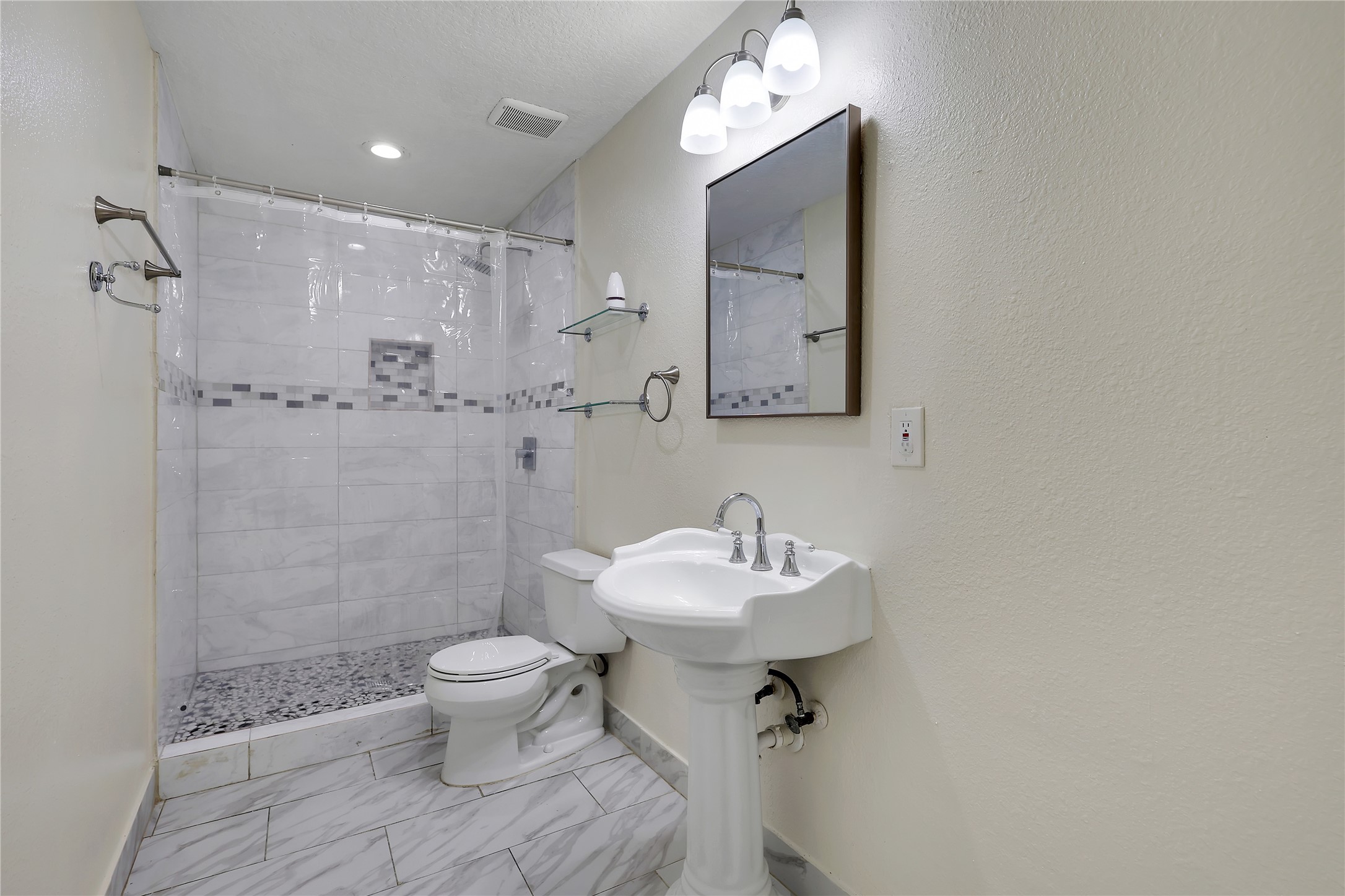 1117 Willersley Lane Channelview, TX 77530 - Photo 8 of 27 a bathroom with a toilet sink and mirror