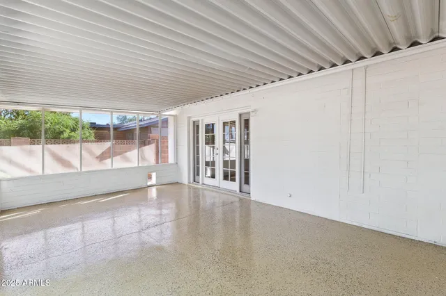 a view of a porch and garden