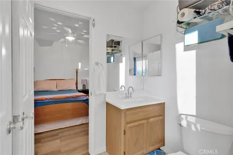 a en suite bathroom with a sink a toilet and shower