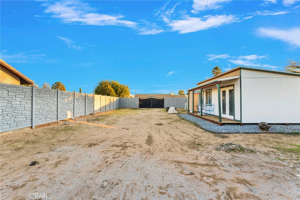 12887 Sholic Road Apple Valley, CA 92308 - Photo 39 of 47 a view of a backyard of the house