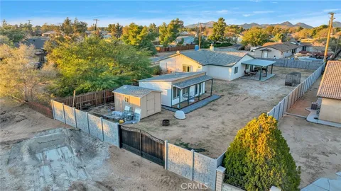 aerial view of a house with a garden