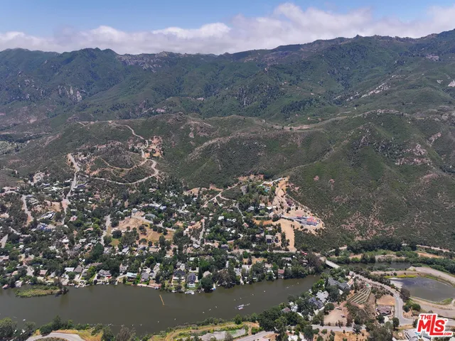 a view of a house with a mountain