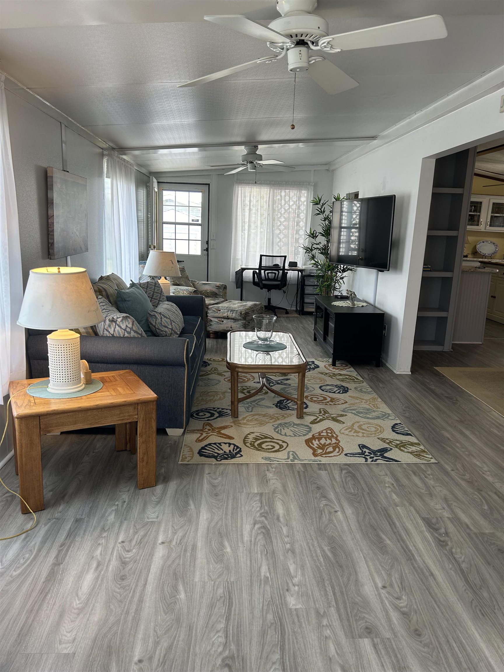 382 Grande Rio Grande, NJ 08242 - Photo 3 of 17 a living room with furniture and a flat screen tv