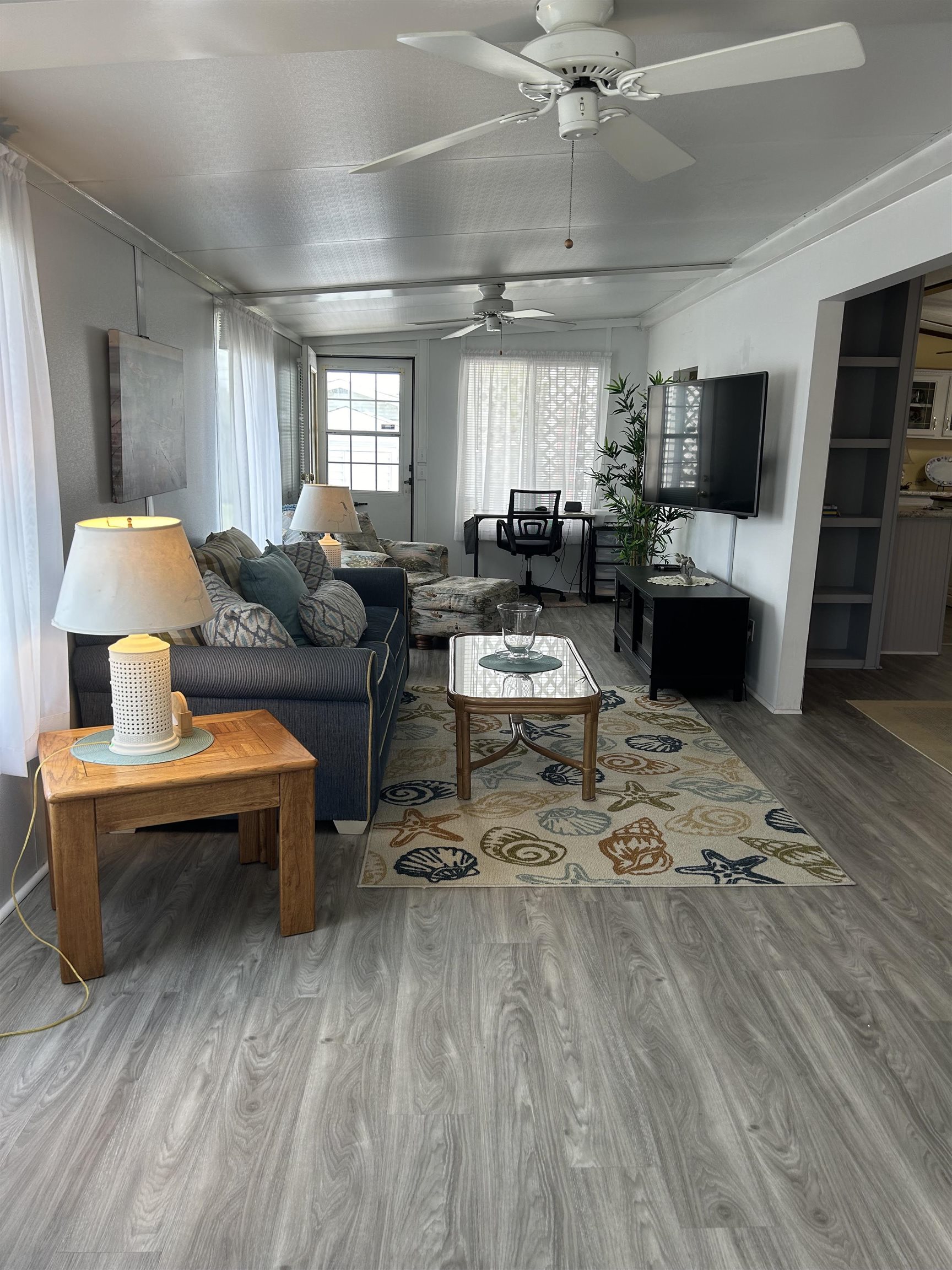 382 Grande Rio Grande, NJ 08242 - Photo 4 of 17 a living room with furniture and a flat screen tv