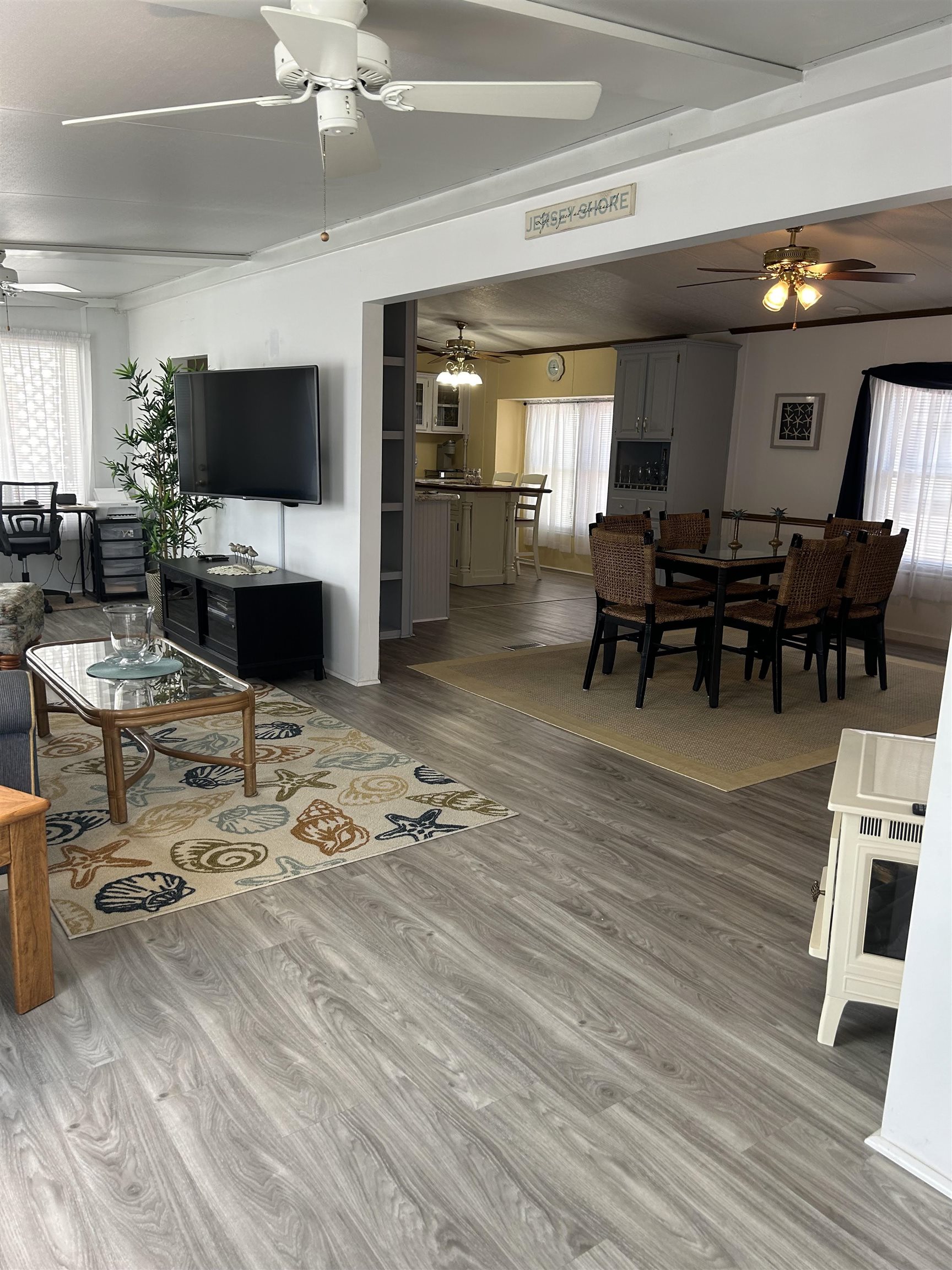 382 Grande Rio Grande, NJ 08242 - Photo 5 of 17 a living room with furniture and a flat screen tv