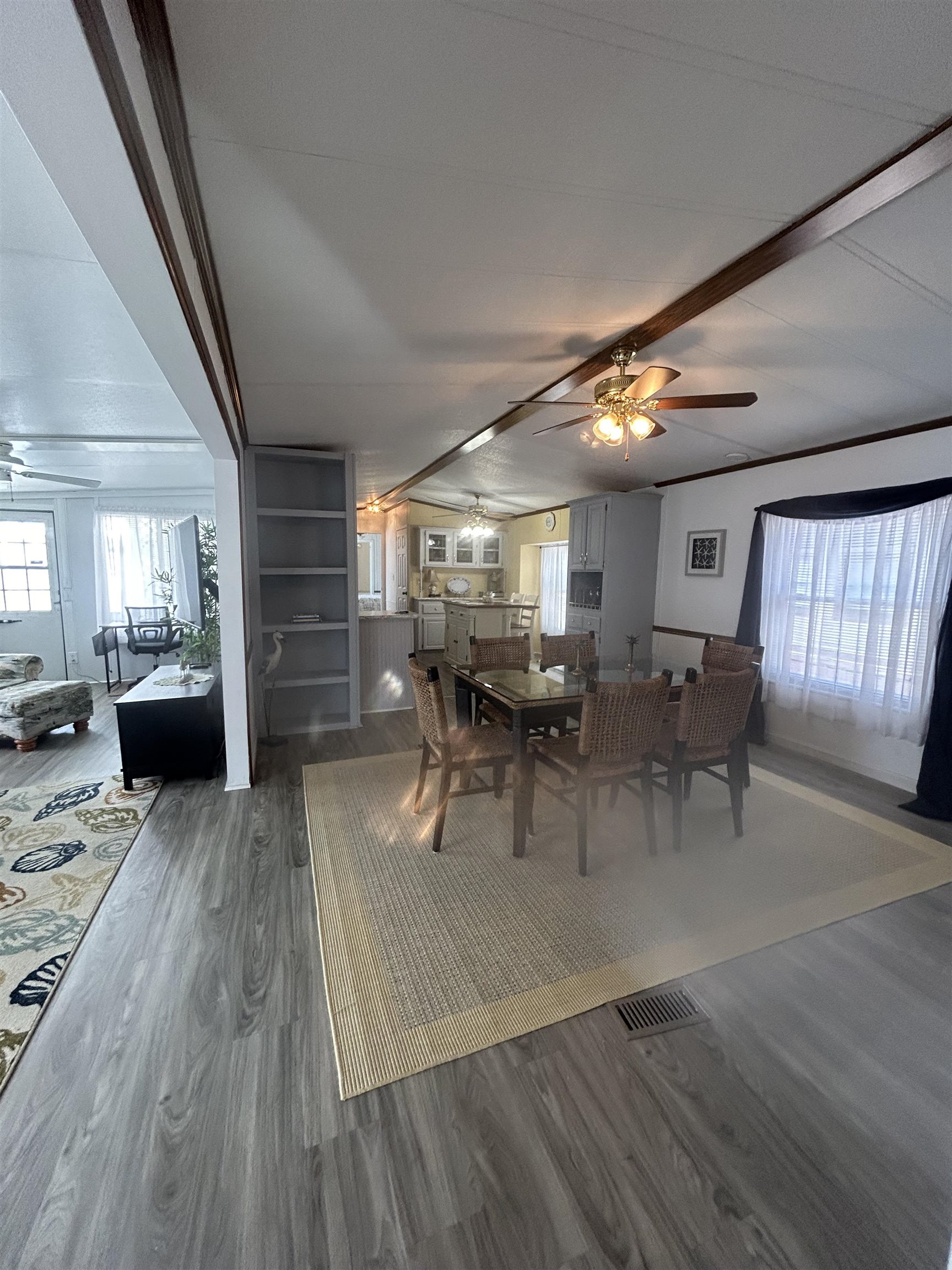 382 Grande Rio Grande, NJ 08242 - Photo 7 of 17 a living room with furniture a wooden floor and a fireplace