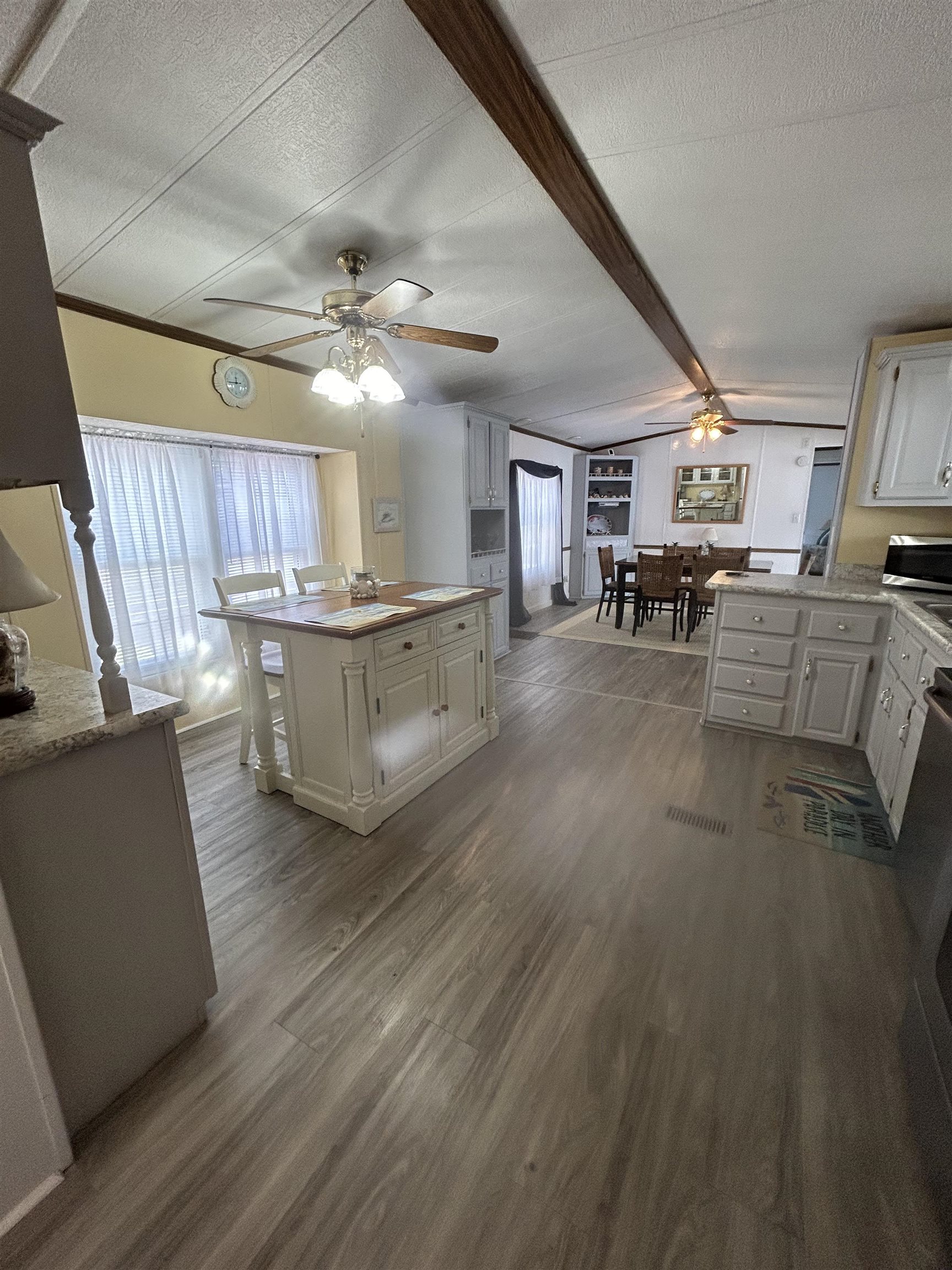 382 Grande Rio Grande, NJ 08242 - Photo 8 of 17 a living room with furniture and a large window