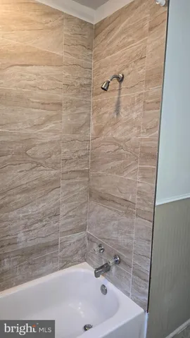 a bathroom with a bathtub