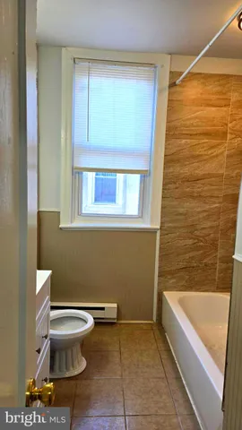 a bathroom with a sink and a bathtub