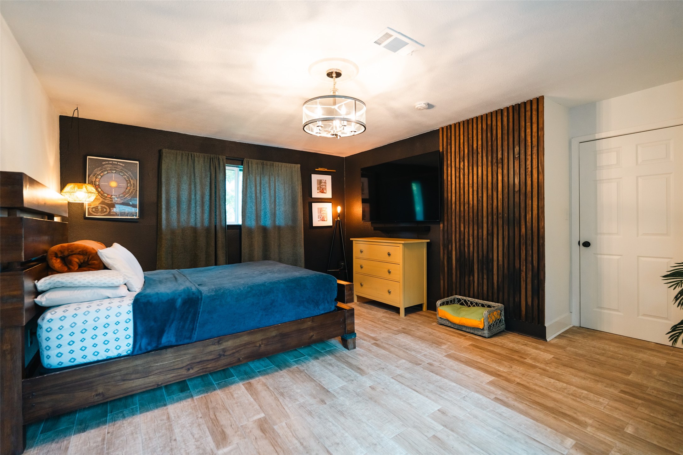 419 Magnolia Bend New Caney, TX 77357 - Photo 11 of 25 a bedroom with a bed window and dresser