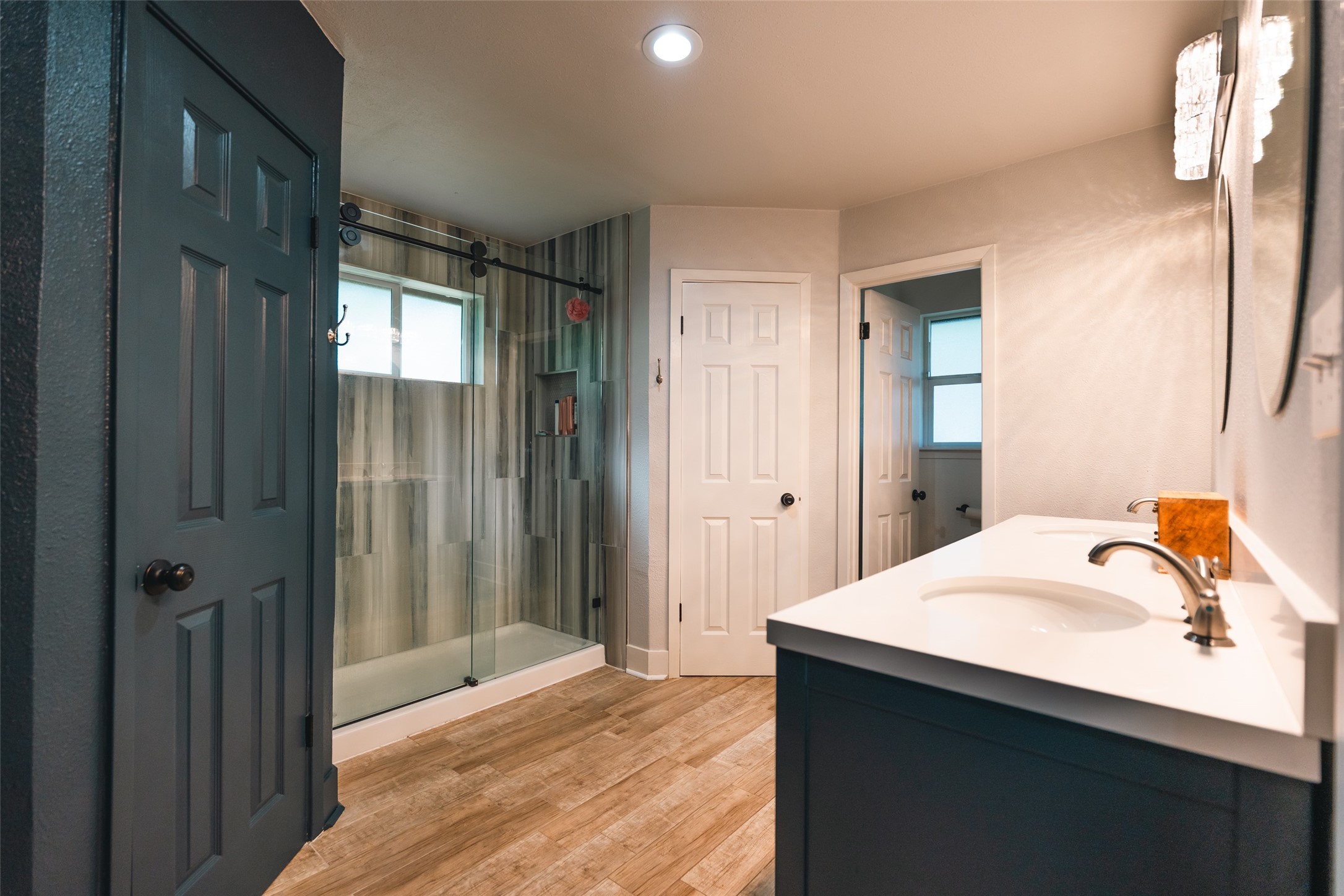 419 Magnolia Bend New Caney, TX 77357 - Photo 13 of 25 a bedroom with a bed and a sink