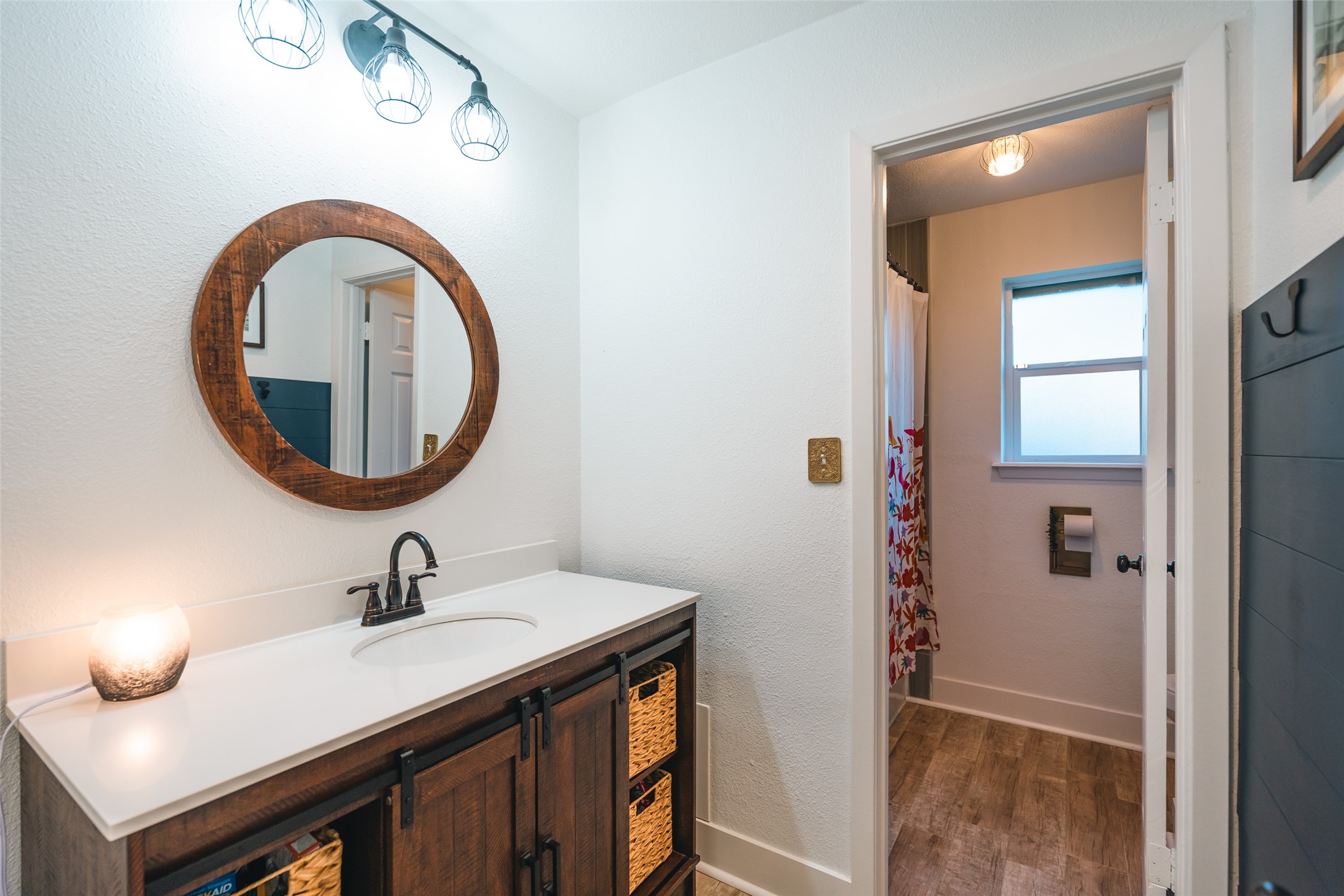 419 Magnolia Bend New Caney, TX 77357 - Photo 15 of 25 a bathroom with a sink and a mirror