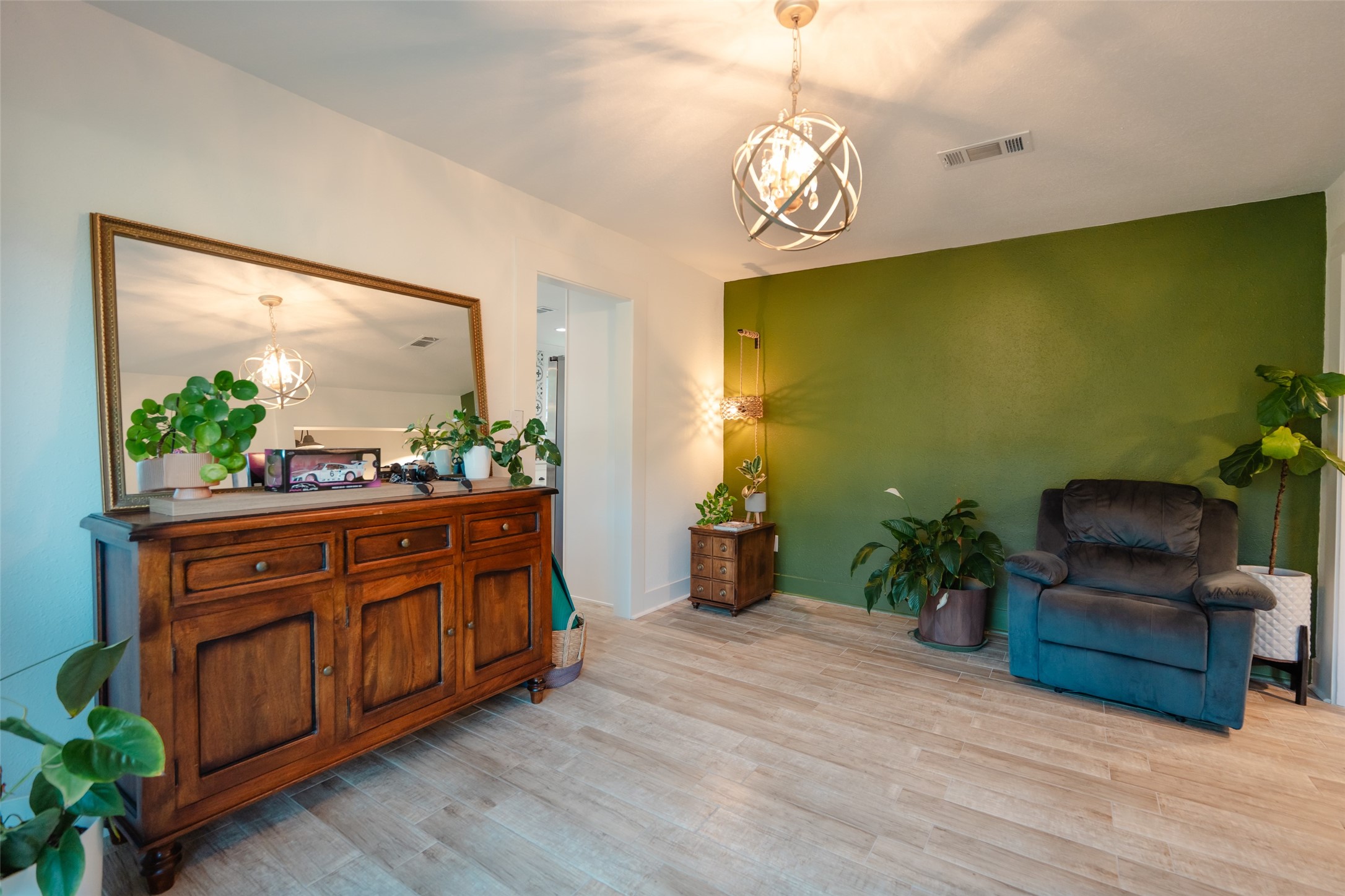 419 Magnolia Bend New Caney, TX 77357 - Photo 4 of 25 a spacious bathroom with a granite countertop sink and a mirror