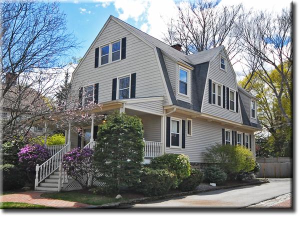 43 Bartlet Street Andover, MA 01810 - Photo 1 of 30 a front view of a house with garden