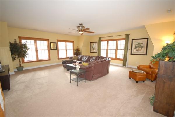 43 Bartlet Street Andover, MA 01810 - Photo 11 of 30 a living room with furniture and a large window