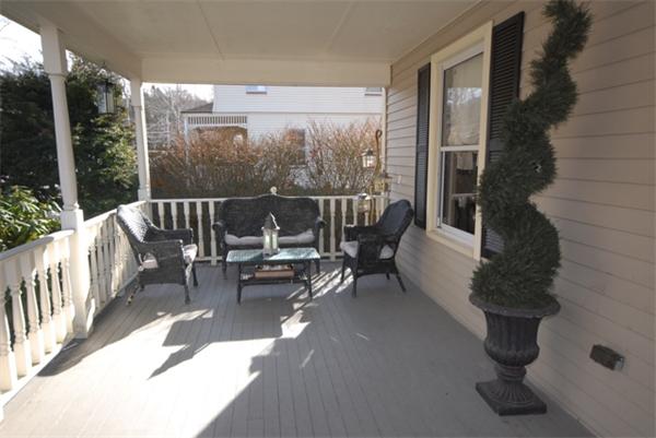 43 Bartlet Street Andover, MA 01810 - Photo 25 of 30 a balcony with chairs and with potted plants