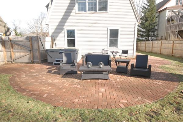 43 Bartlet Street Andover, MA 01810 - Photo 28 of 30 a view of a patio with a table chairs and a patio