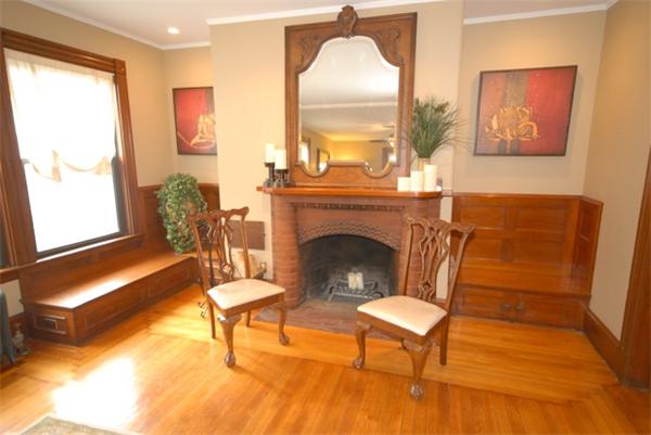 43 Bartlet Street Andover, MA 01810 - Photo 9 of 30 a living room with furniture and a fireplace