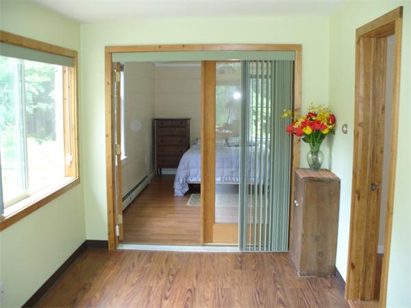 80 Pomeroy Meadow Road Southampton, MA 01073 - Photo 12 of 23 a view of a hallway with wooden floor and front door