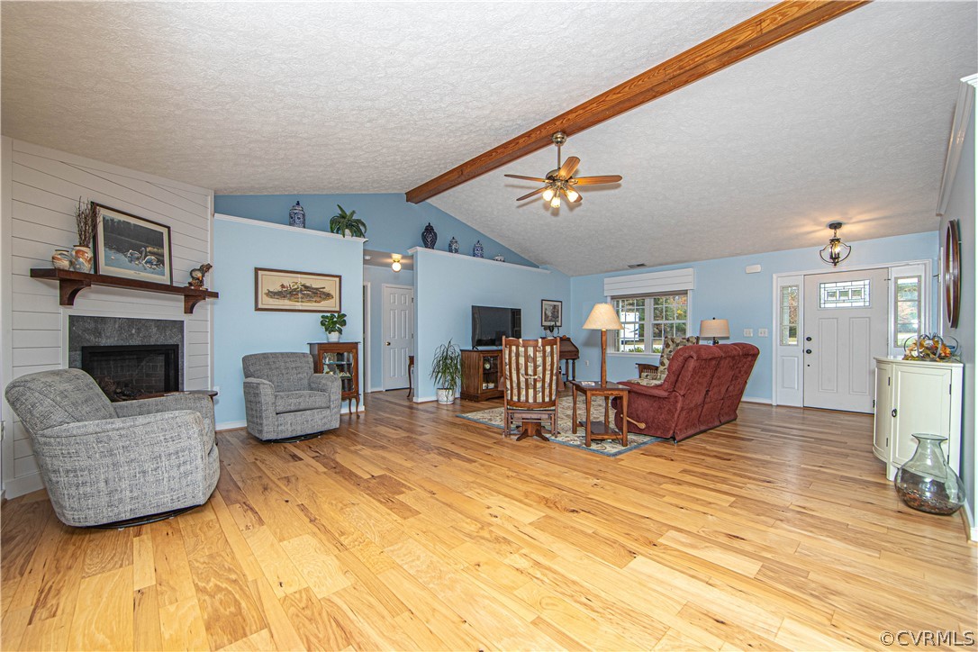 24410 Johnson Road Jetersville, VA 23083 - Photo 12 of 47 a living room with furniture and a fireplace