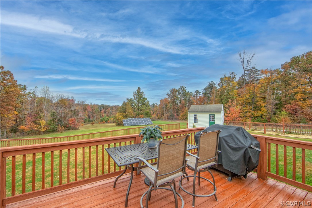 24410 Johnson Road Jetersville, VA 23083 - Photo 26 of 47 a view of a balcony with furniture and wooden floor