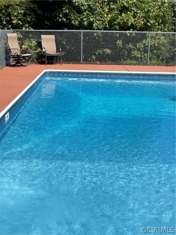 24410 Johnson Road Jetersville, VA 23083 - Photo 29 of 47 a view of yard with swimming pool and seating