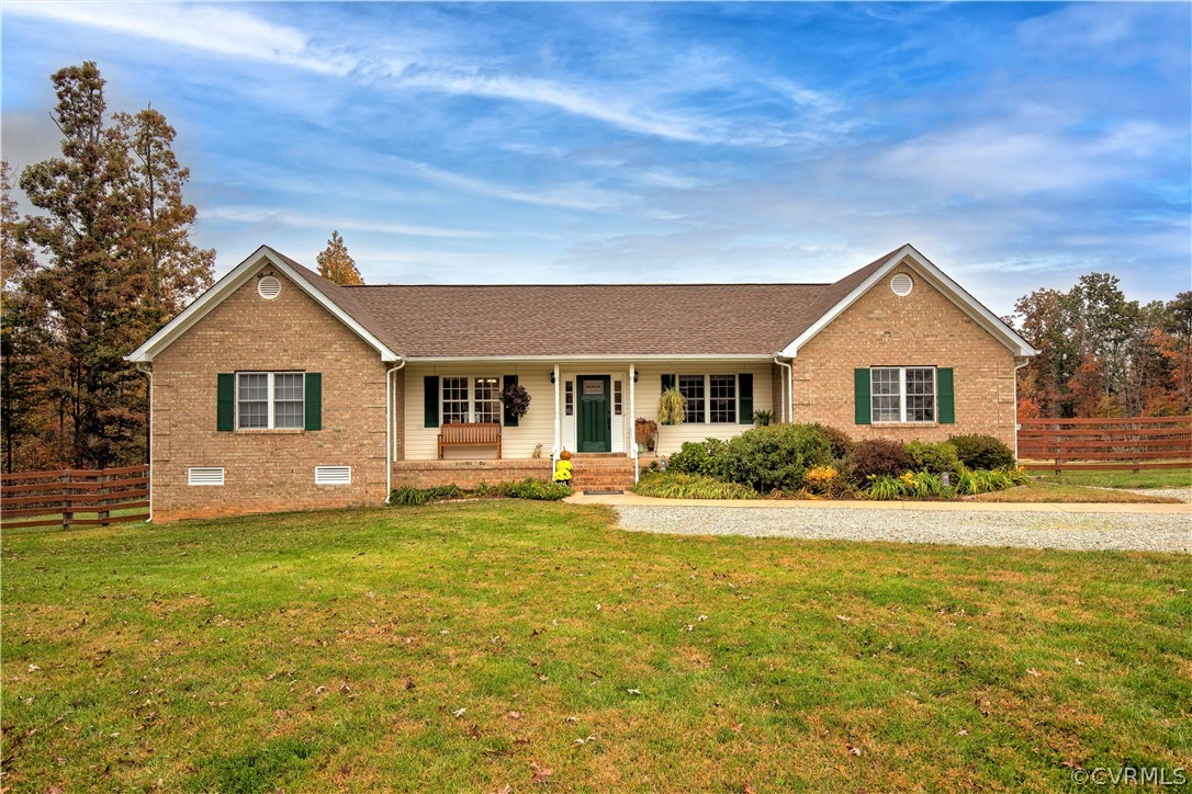 24410 Johnson Road Jetersville, VA 23083 - Photo 4 of 47 a front view of house with yard and green space