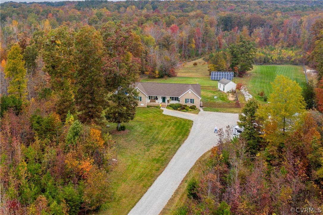 24410 Johnson Road Jetersville, VA 23083 - Photo 6 of 47 a view of a lake with houses