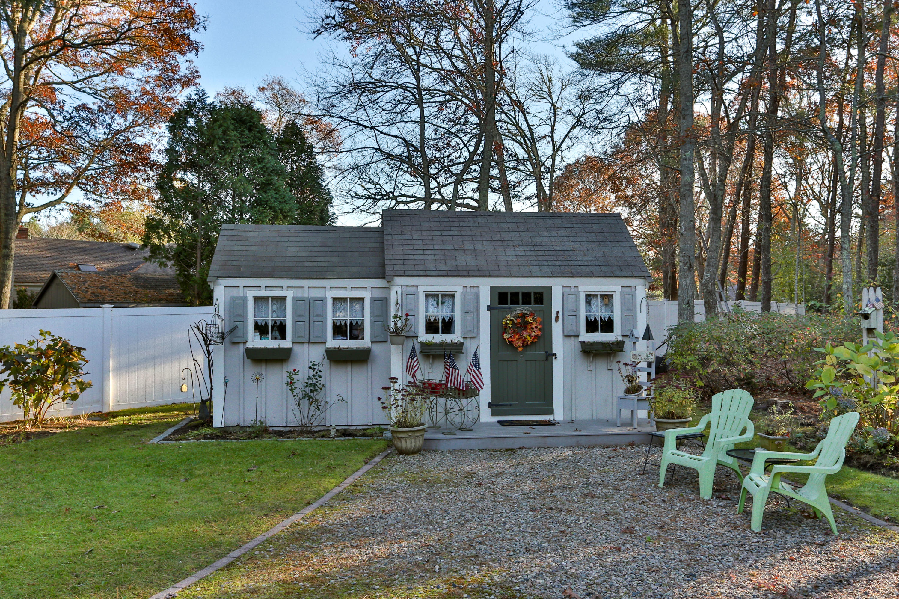 70 South Precinct Road Centerville, MA 02632 - Photo 30 of 32 a view of a house with backyard and sitting area