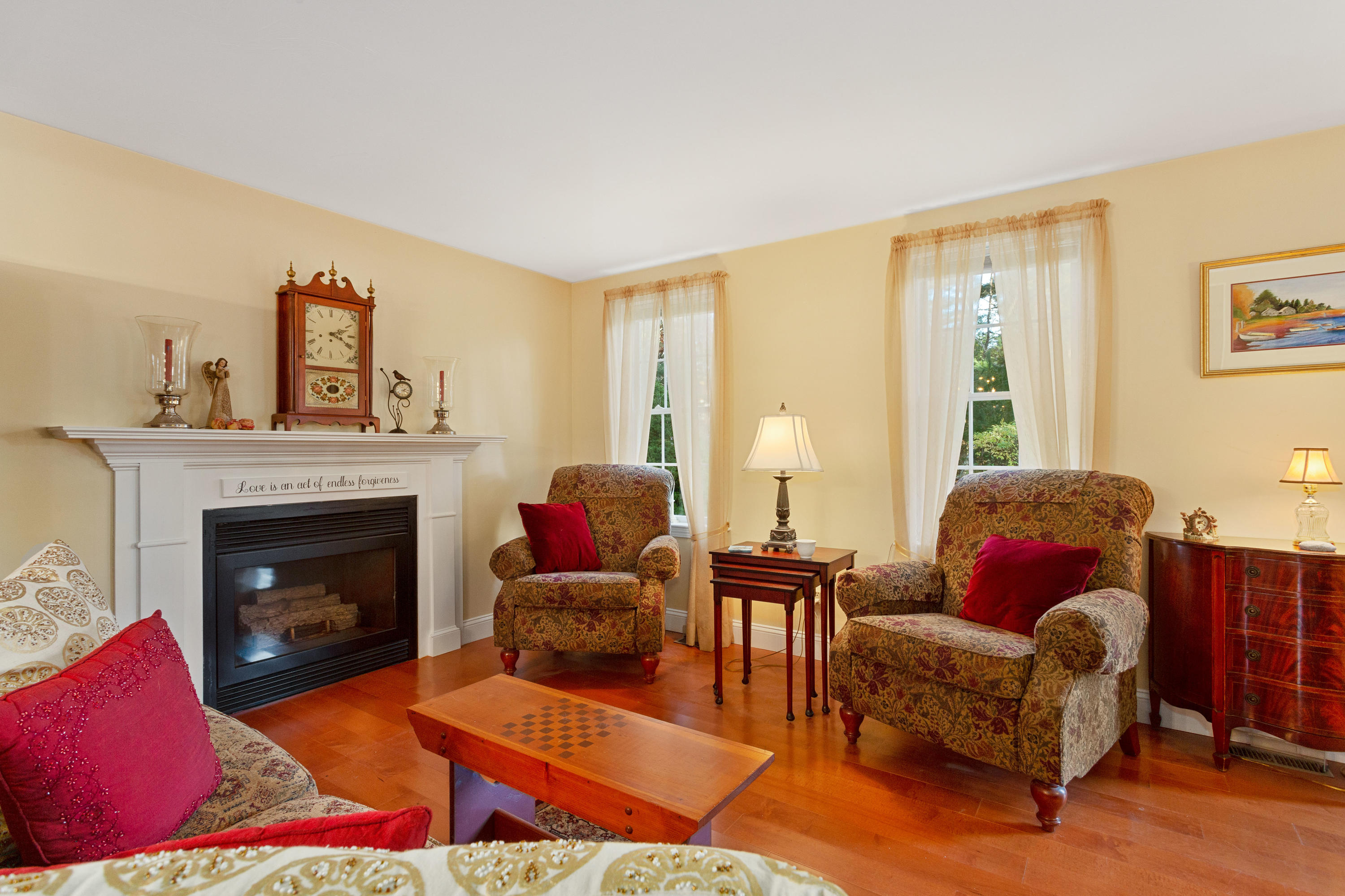 70 South Precinct Road Centerville, MA 02632 - Photo 7 of 32 a living room with furniture and a fireplace