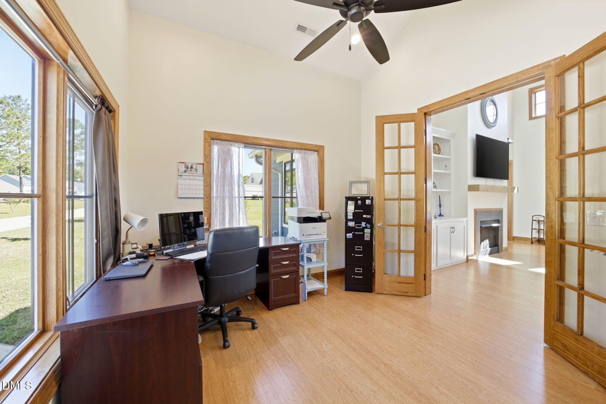 35 North Rippling Court Smithfield, NC 27577 - Photo 30 of 59 a view of a livingroom with workspace and windows