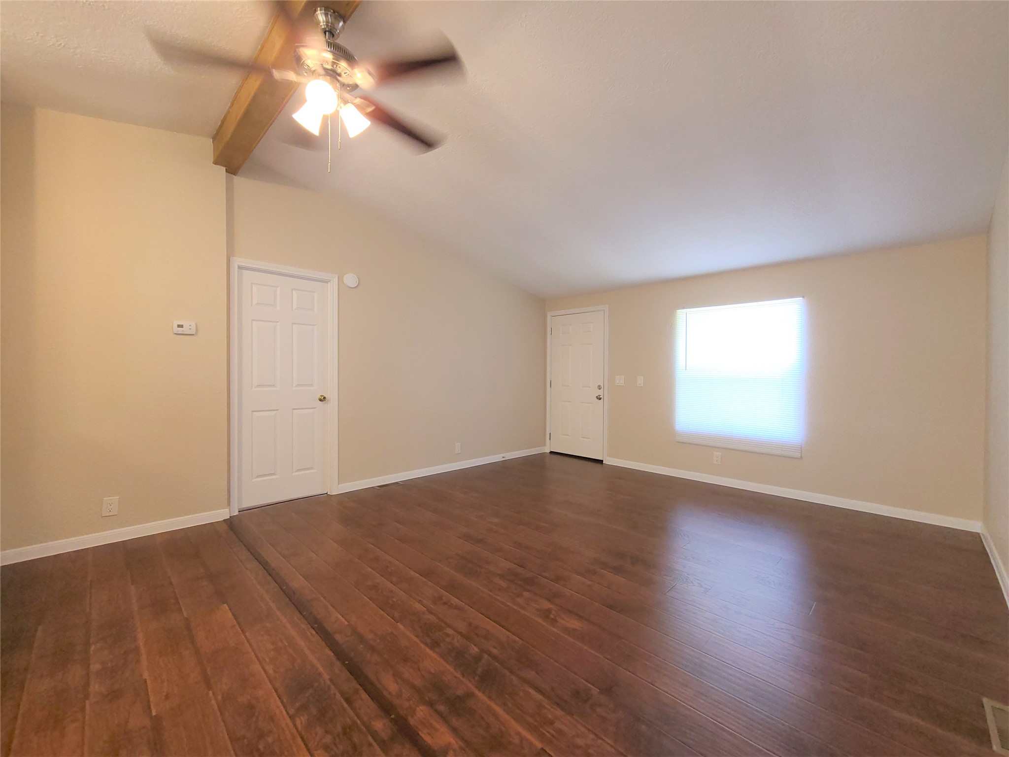 5414 Five Oaks Drive Spring, TX 77389 - Photo 6 of 13 wooden floor in an empty room with a window