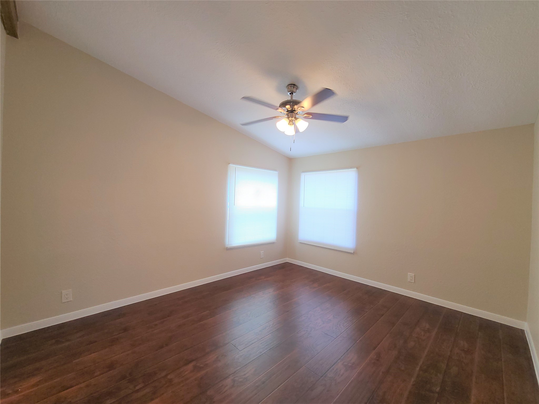 5414 Five Oaks Drive Spring, TX 77389 - Photo 9 of 13 a view of an empty room with a window and wooden floor