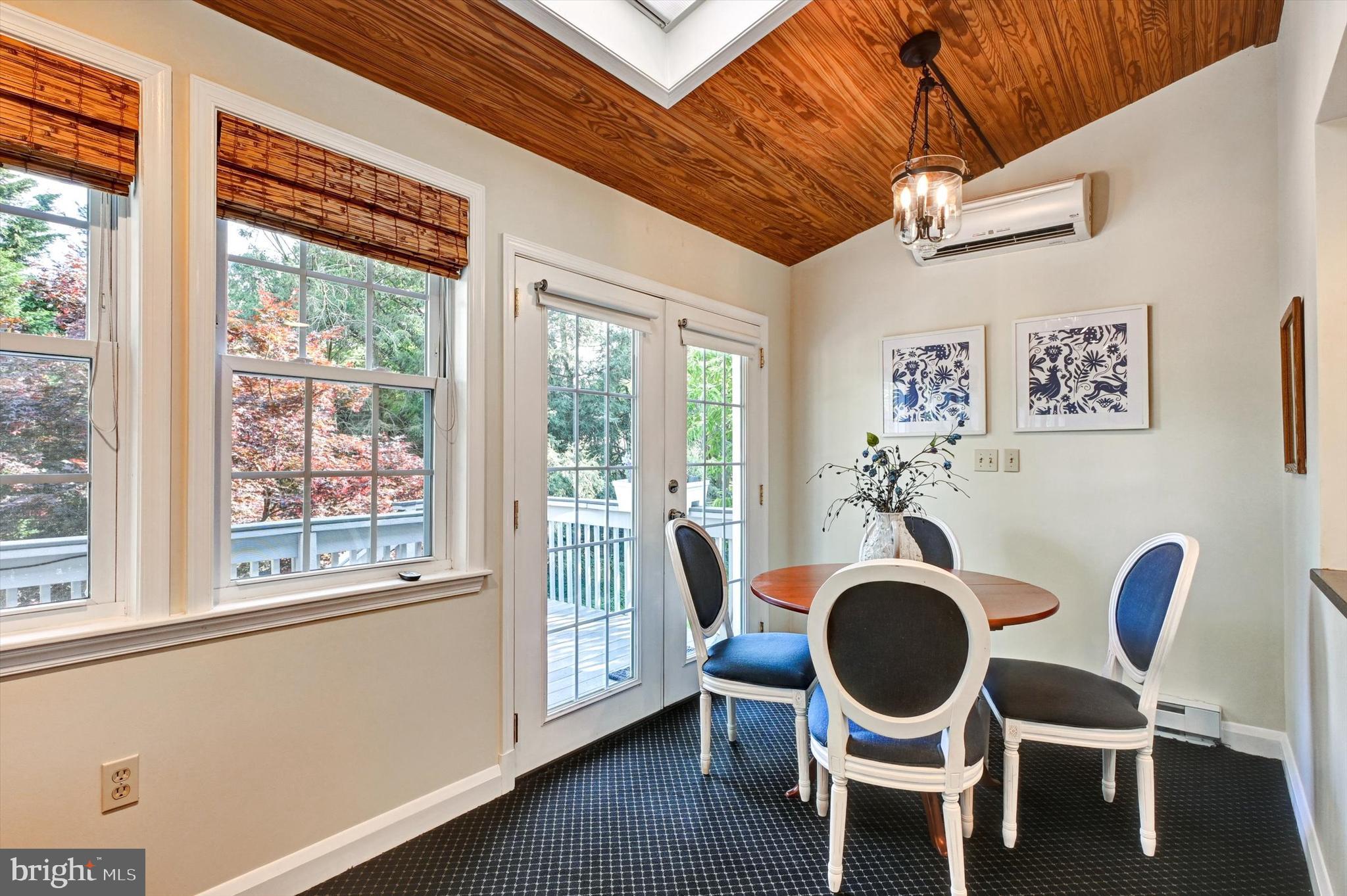 605 Worcester Road Towson, MD 21286 - Photo 14 of 39 a dining room with furniture a rug and wooden floor