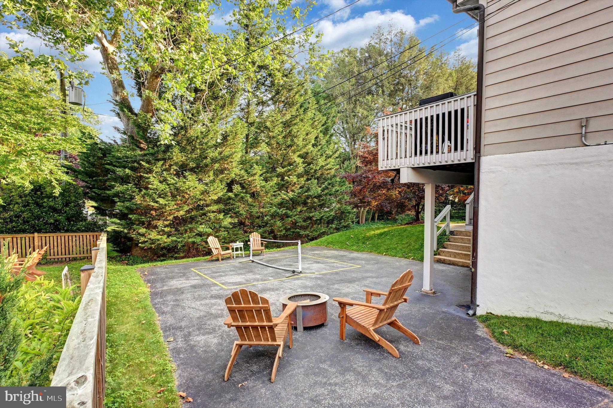 605 Worcester Road Towson, MD 21286 - Photo 35 of 39 a view of a patio with a table and chairs