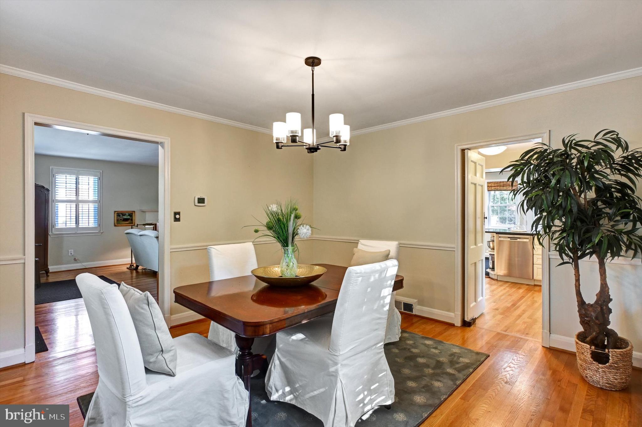 605 Worcester Road Towson, MD 21286 - Photo 8 of 39 a view of a dining room with furniture and wooden floor