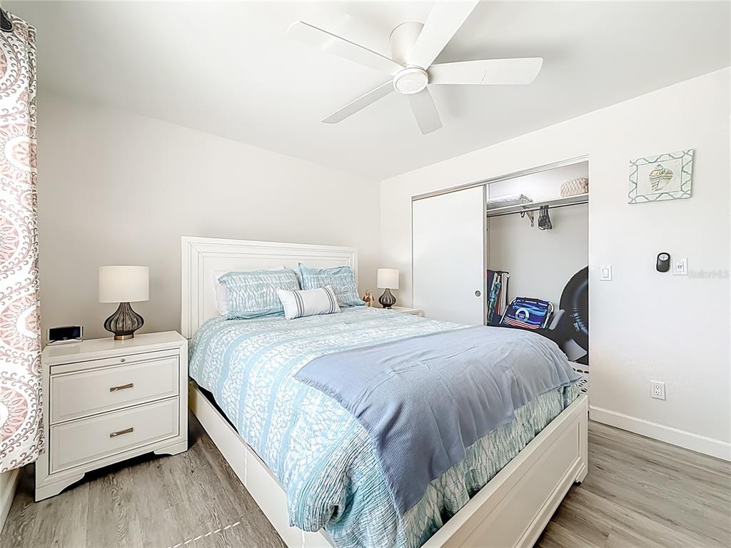 19725 Gulf Boulevard, Unit 46 Indian Rocks Beach, FL 33785 - Photo 24 of 55 a bedroom with a bed and a closet