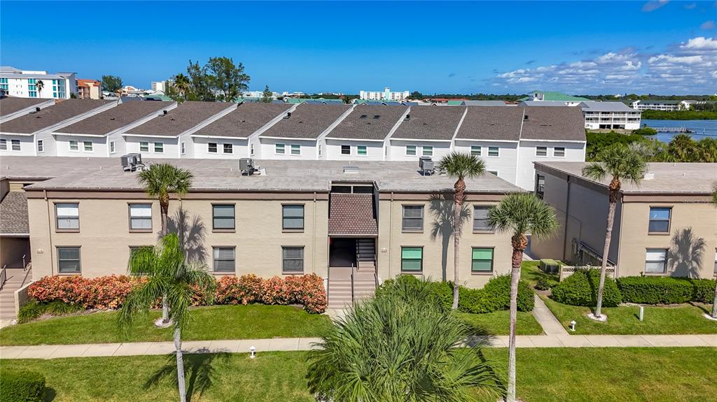 19725 Gulf Boulevard, Unit 46 Indian Rocks Beach, FL 33785 - Photo 39 of 55 front view of a house with a yard