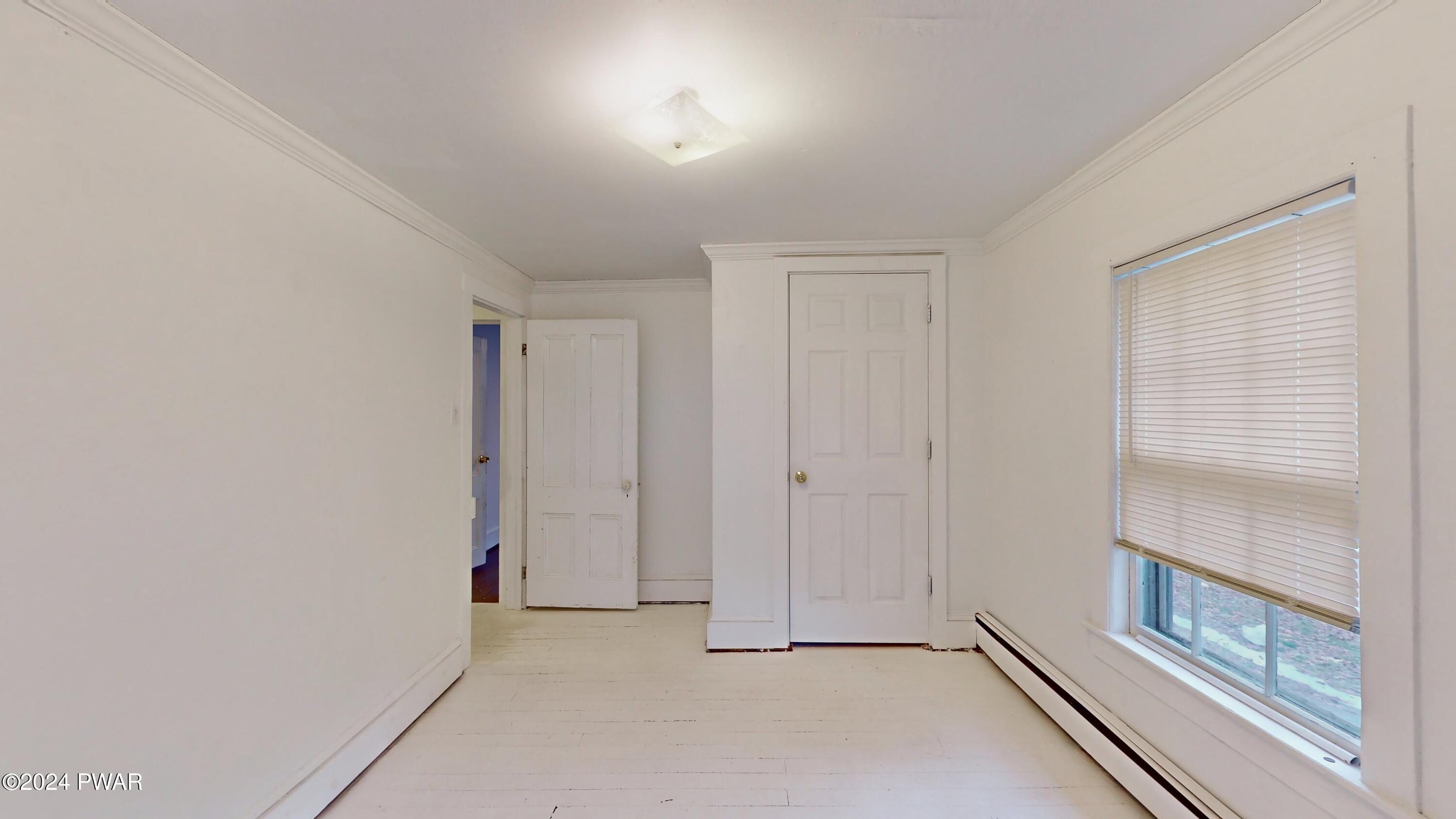 108 9th Street Milford, PA 18337 - Photo 19 of 38 a view of an empty room and window