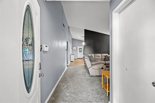 a view of a walk in closet and bedroom