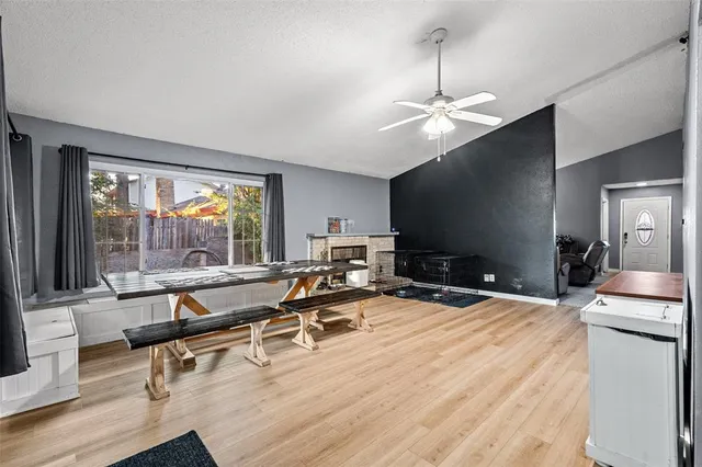 a room with gym equipment and a large window