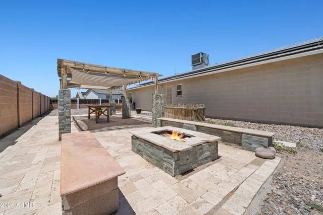 a backyard of a house with wooden floor