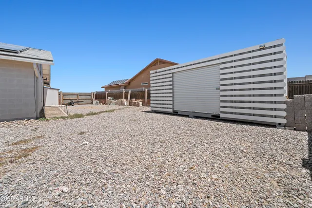 an aerial view of a house with a garden